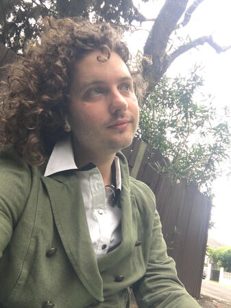 Aemyn Zephyr Connolly is a poet and musician who creates through sound, print and performance. Since 2010 they’ve been an insatiable songwriter, writing a vast, eclectic body of work to express their inner world, and hone their storytelling craft.